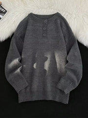 Dark gray ribbed long-sleeve knit sweater with button detail at the neckline.