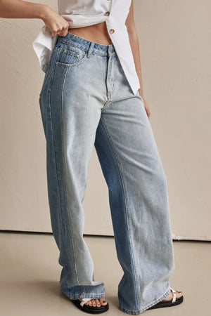 Panelled wide-leg light wash denim trousers with contrast stitching.