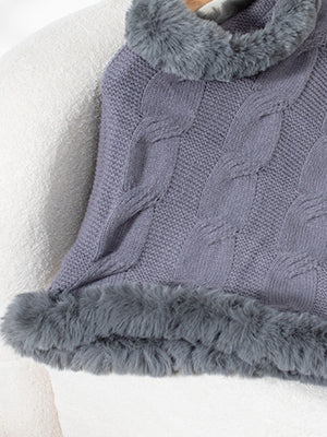 Dark Gray cable knit poncho with faux fur trim and detailed texture.