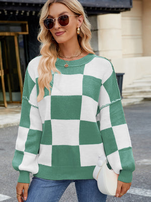 Checkerboard knit sweater in Gum Leaf green and white with balloon sleeves and crew neck.