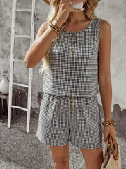 Black gingham two-piece set with button detail on top and shorts.