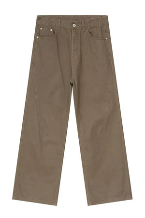Brown wide-leg denim jeans with angular seams and a casual fit.