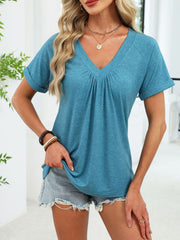 Blue-green ruched V-neck short sleeve t-shirt with cuffed sleeves.