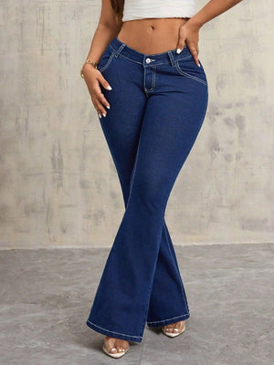 Dark wash denim flare jeans with contrast stitching and a low rise waist.