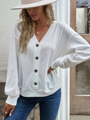 White waffle knit button-down cardigan with V-neck and brown buttons