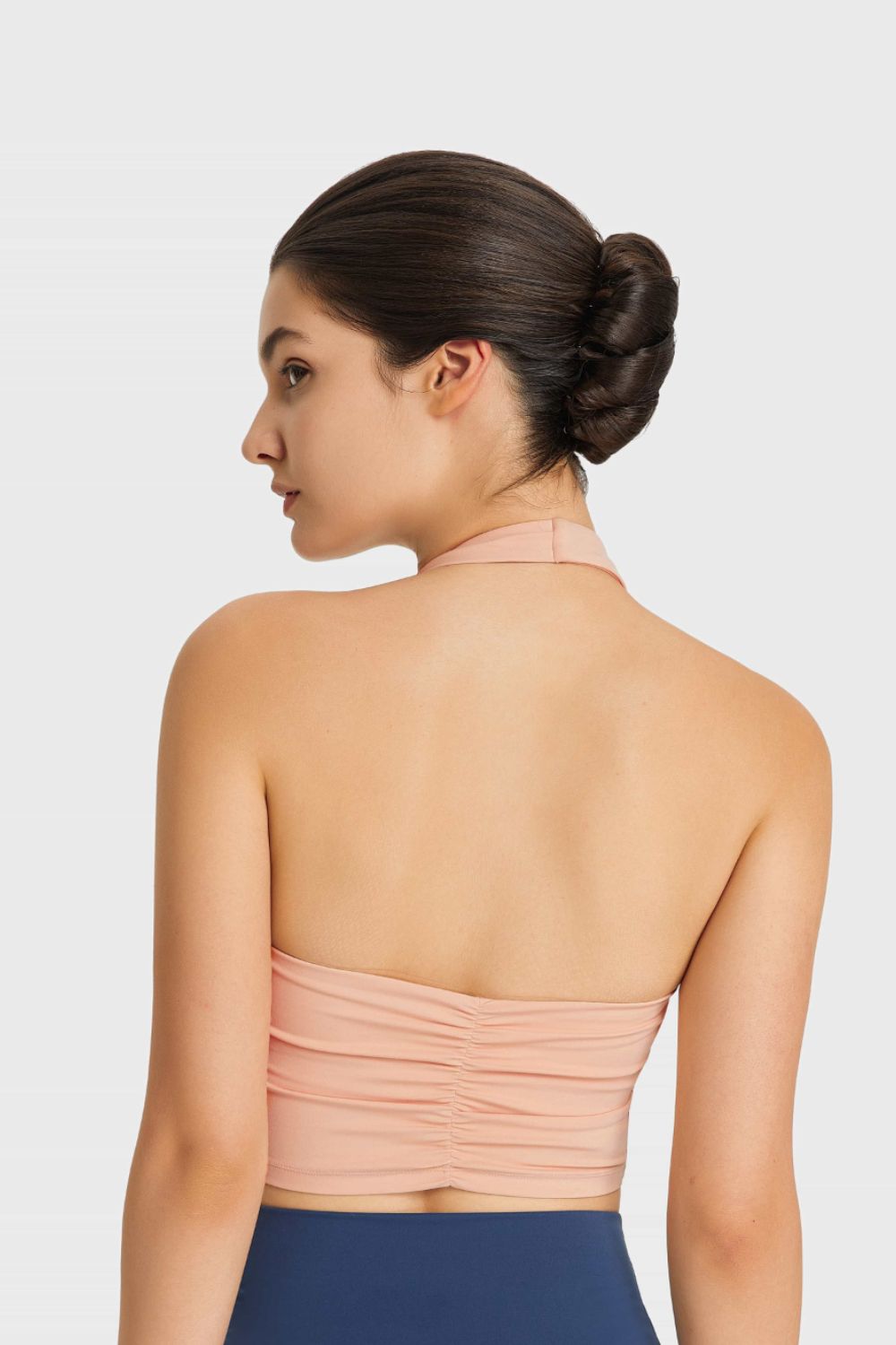 Nude halter neck sports bra with ruched back detail