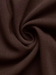 Brown A-line midi dress fabric detail, showing textured knit and soft drape.