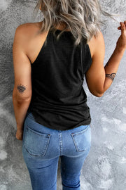 Black halter tank top with a graphic detail on the back, paired with blue jeans.