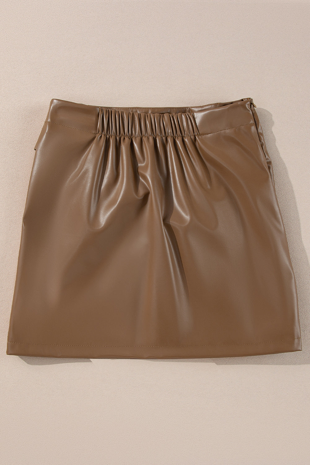 Brown faux leather mini skirt with ruched waist detail