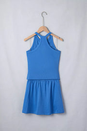 Blue ribbed cropped tank top and skort set with elastic waistband.