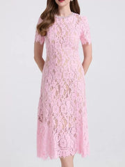 Pink lace midi dress with pearl neckline and short sleeves.