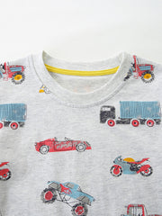 Toddler grey cotton t-shirt with a playful vehicle print, featuring trucks, cars, and motorcycles.