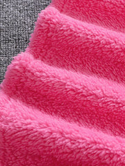 Fuzzy hot pink kids sweatshirt with plush texture.