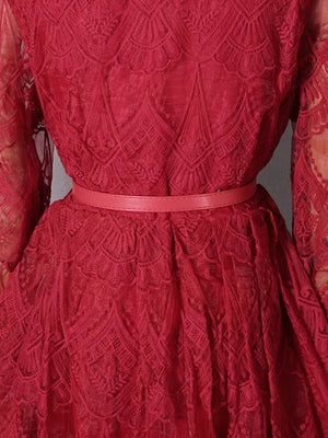 Red lace midi dress with ornate pattern and matching belt.