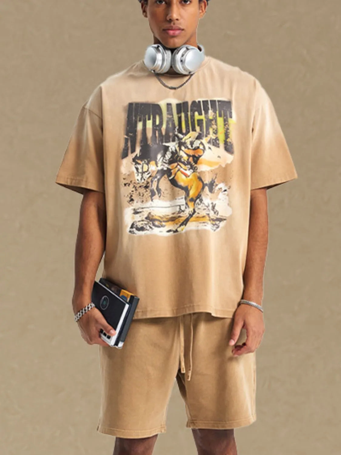 Vintage graphic oversized tee in khaki with a distressed cowboy print and short sleeves.