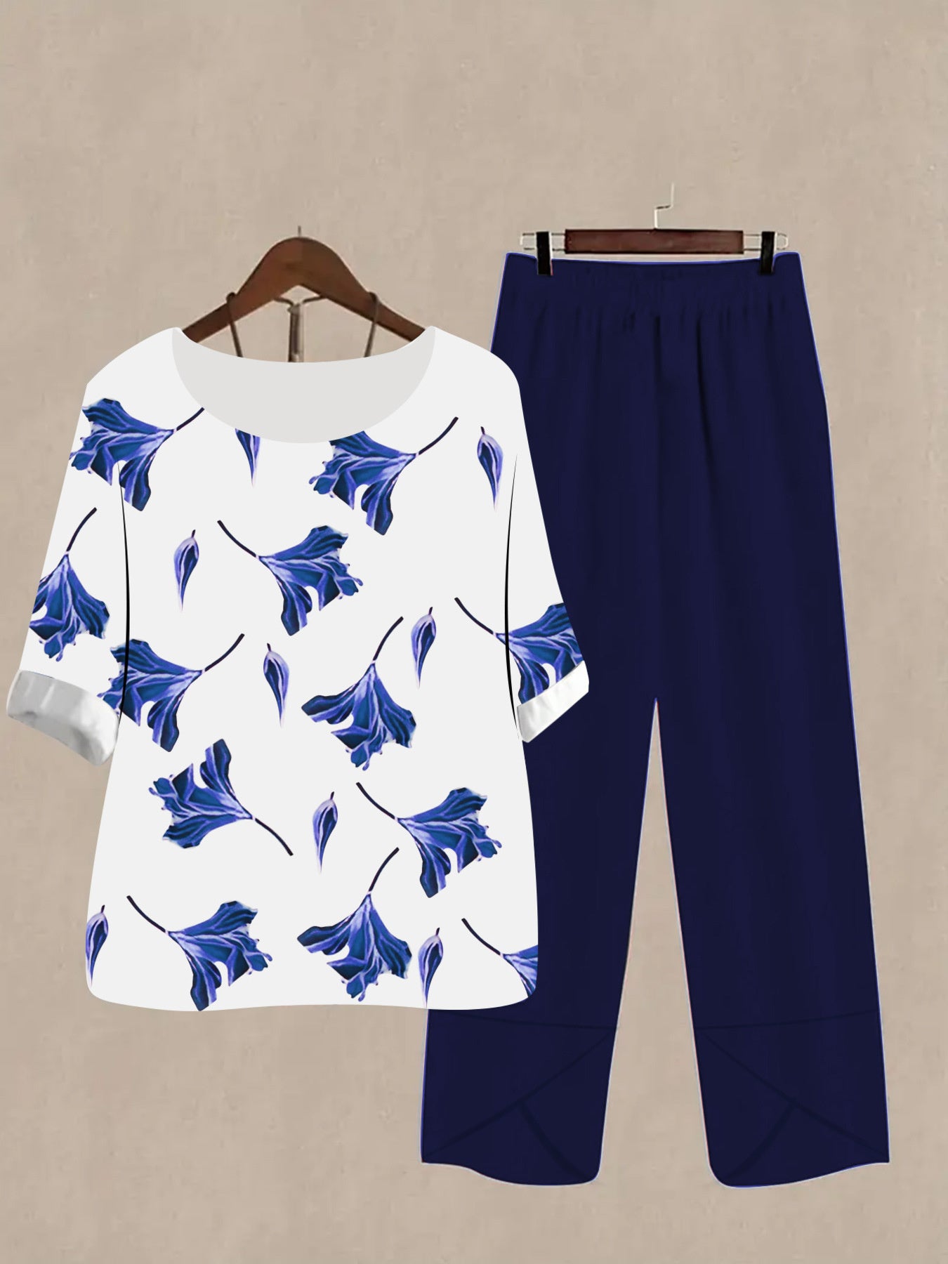 Floral print half sleeve top and navy blue pants outfit set