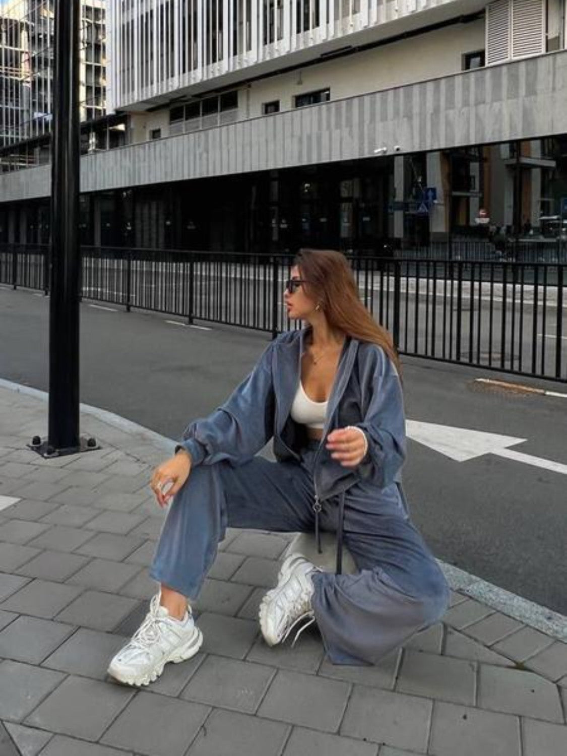 Plush velour lounge set in blue with wide leg pants and zip-up hoodie.