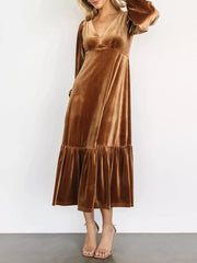 Gold velvet midi dress with tiered skirt and v-neck