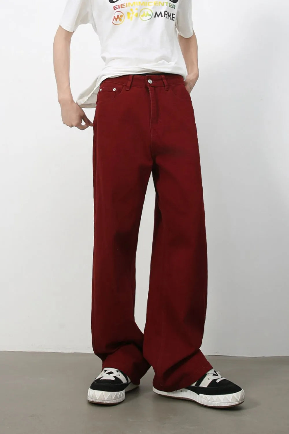 Burgundy wide-leg denim trousers with a casual, baggy fit.