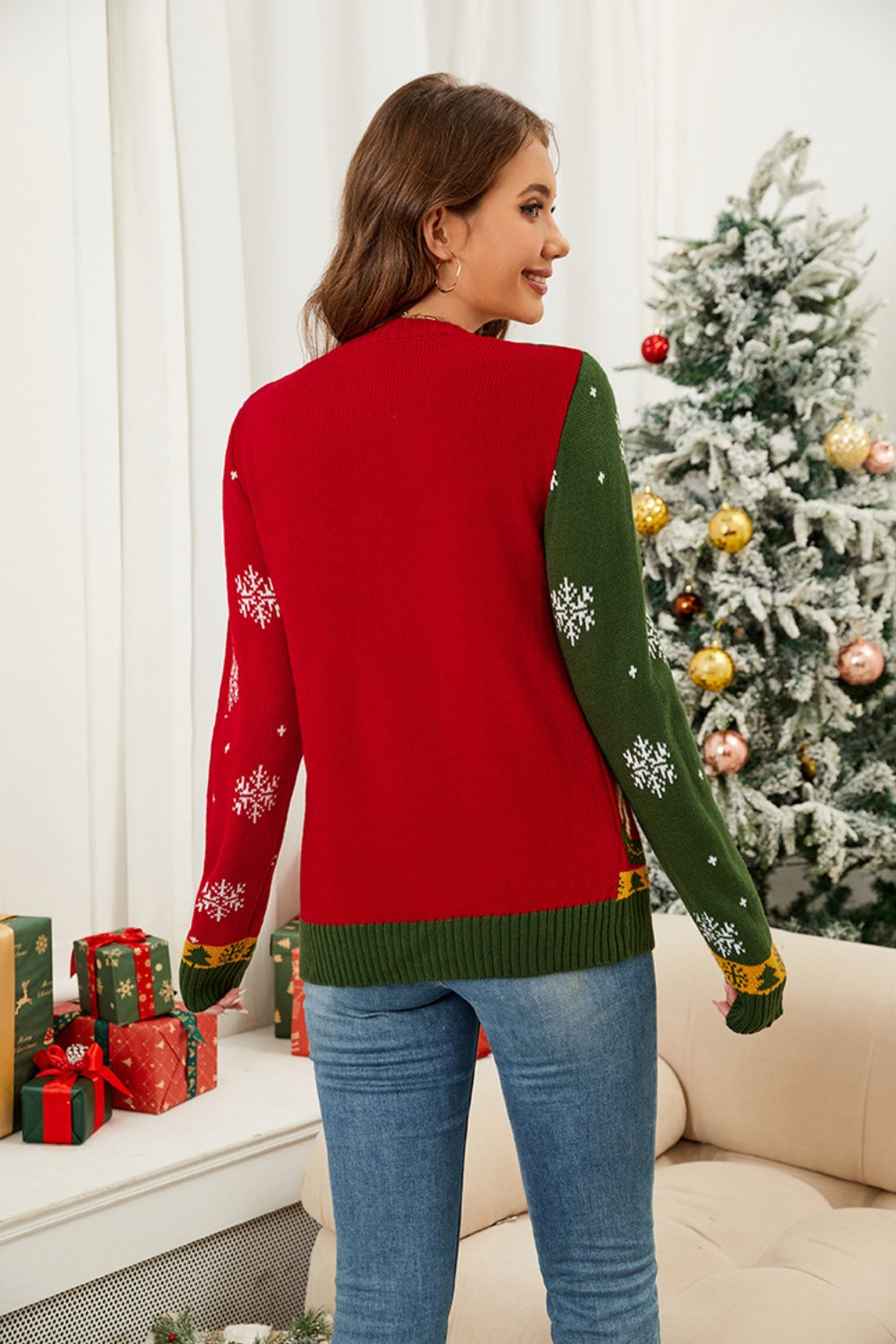 Festive Fair Isle button-down cardigan in red and green with snowflake pattern.