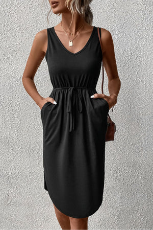 Black sleeveless V-neck dress with drawstring waist and asymmetric hem