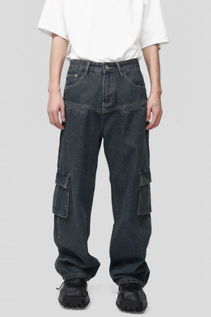 Panelled dark wash denim cargo pants with multiple pockets and a relaxed fit.