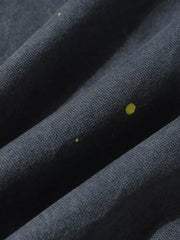 Grey sweatpants with yellow ink-splash detail, loose fit, comfortable casual activewear.