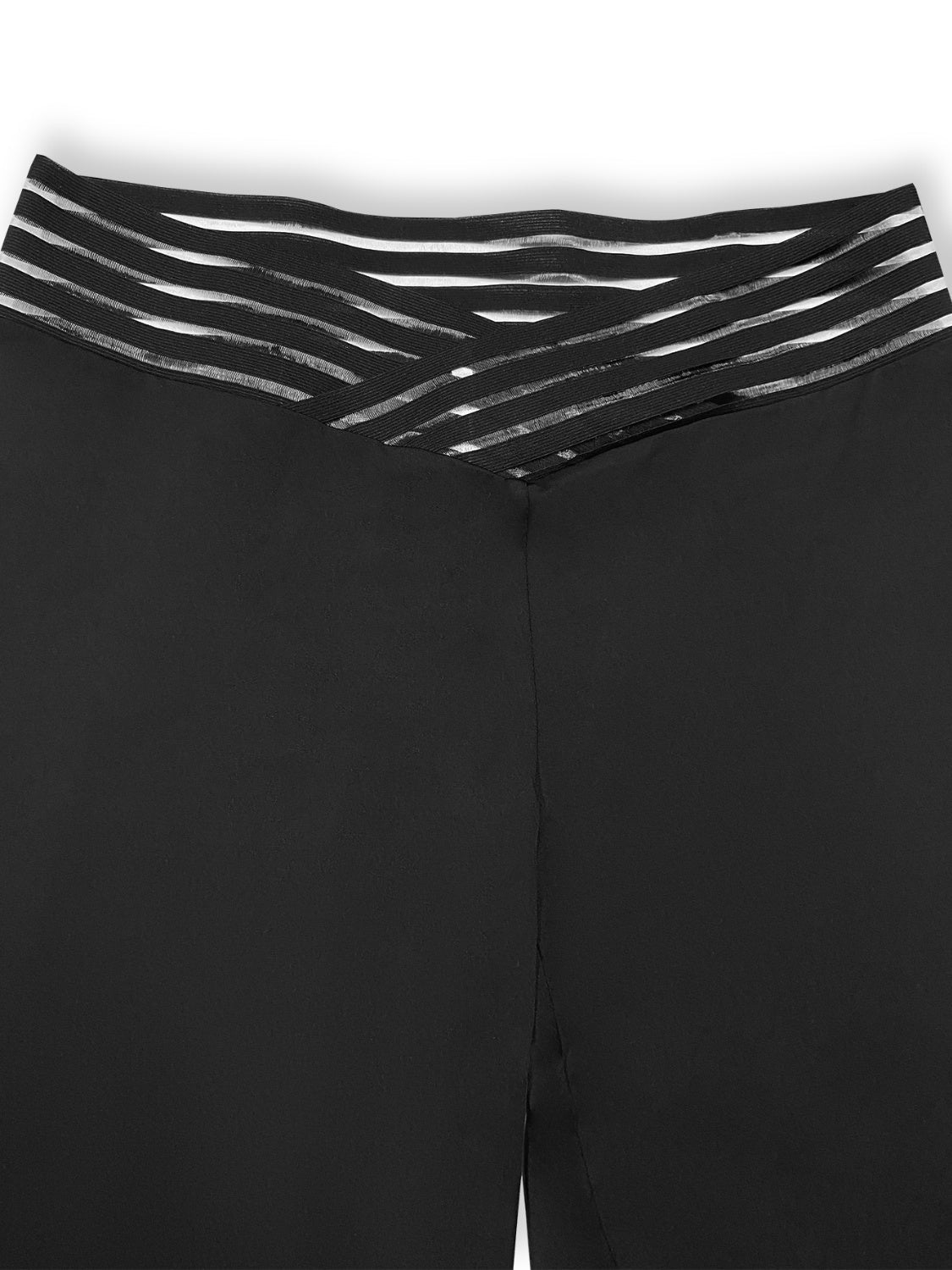 Black flare leggings with a crossover waistband featuring striped elastic detail