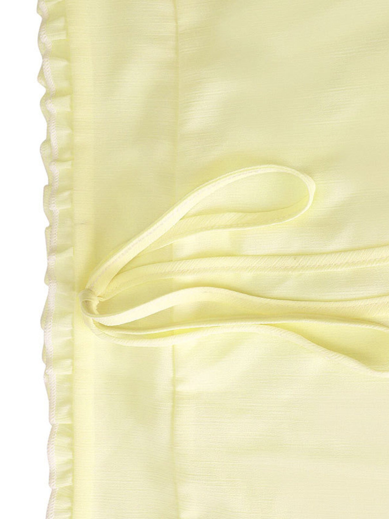 Apricot cami set with ruffled hem and tie detail.