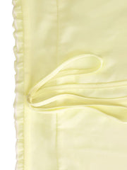 Apricot cami set with ruffled hem and tie detail.