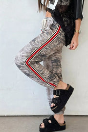 Camo print relaxed fit maternity pants with drawstring and side stripe detail.