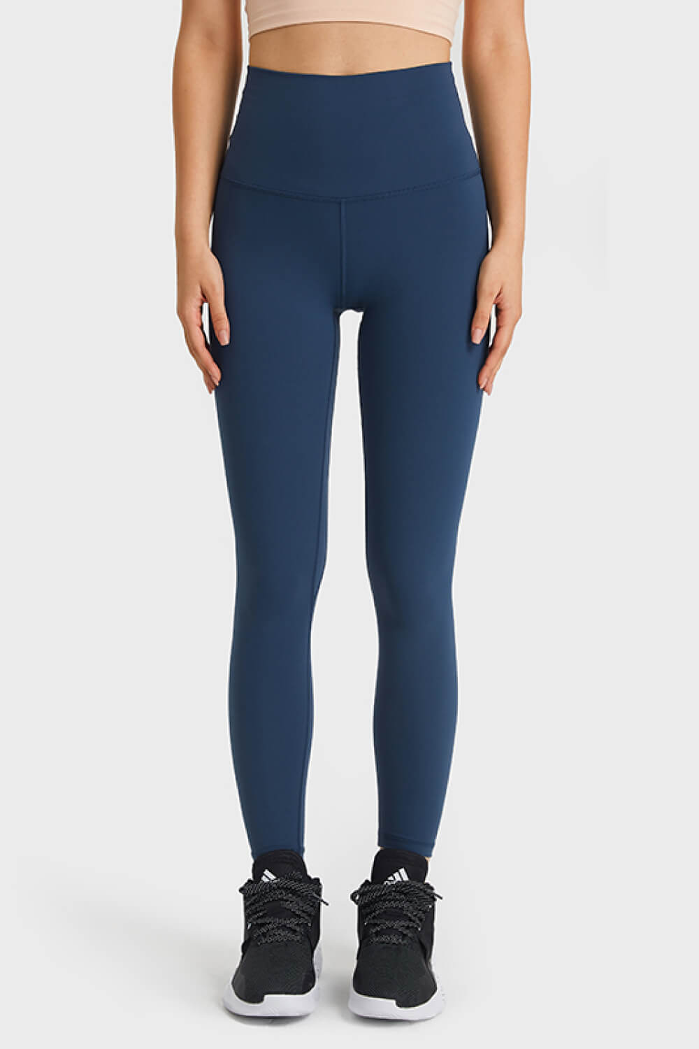Navy high rise leggings with a seamless waistband and full length fit.