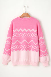 Pink acrylic knit pullover sweater with geometric pattern and colorblock detail.