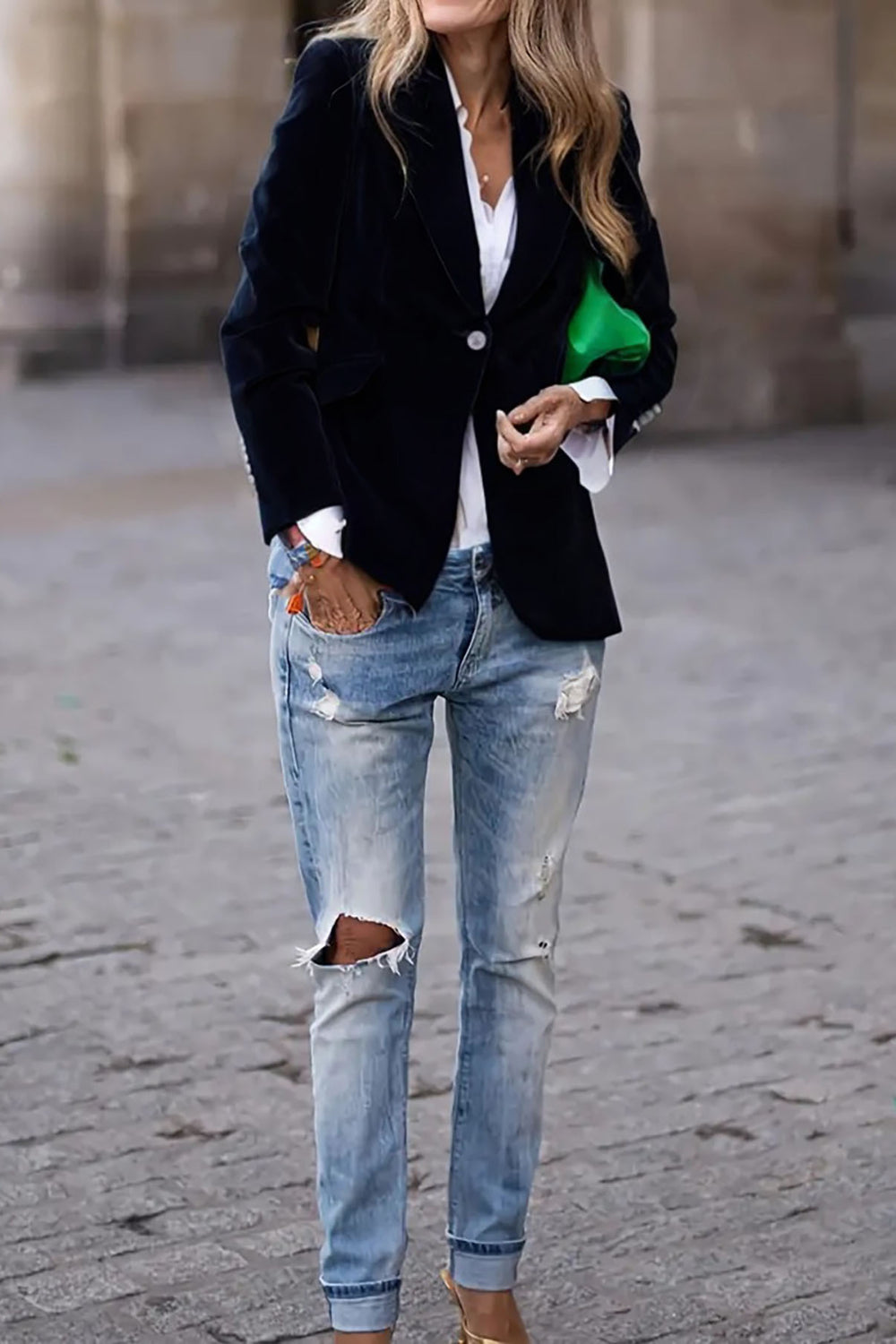 Navy velvet blazer jacket with one button closure and notched collar.