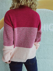 Colorblock textured knit pullover sweater in pink and maroon with waffle knit detail.