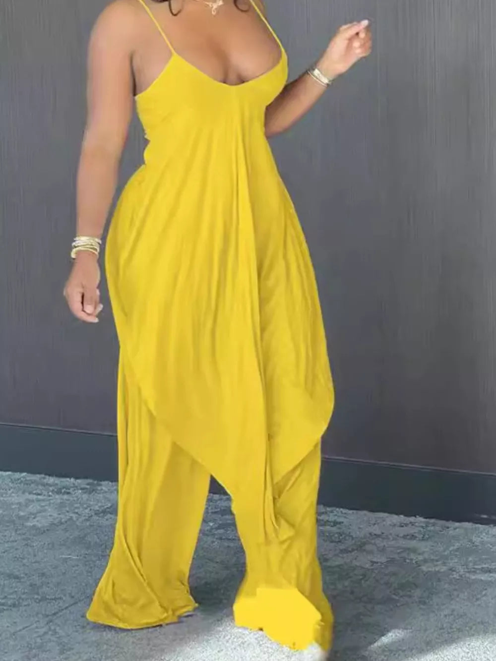 Yellow cami and wide-leg pants set with asymmetrical draped hem.