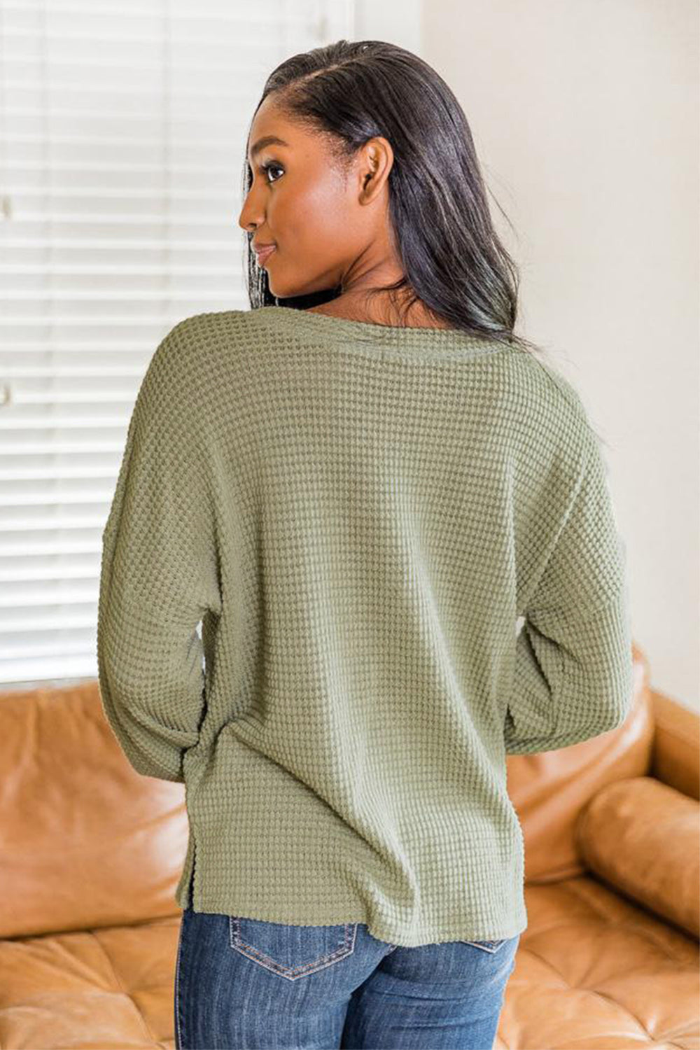 Waffle knit henley pullover in Matcha Green with long sleeves and a relaxed fit.