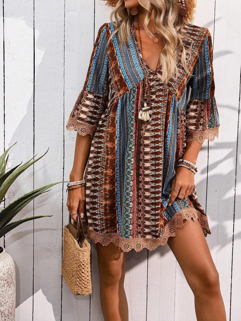 Bohemian printed v-neck dress with bell sleeves and lace trim
