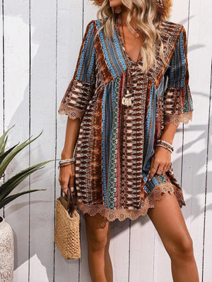 Bohemian printed v-neck dress with bell sleeves and lace trim