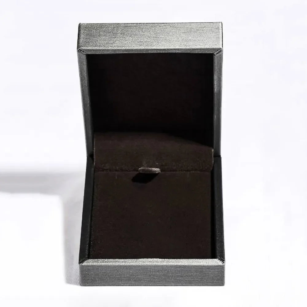 Silver jewelry box with dark velvet interior and clasp.