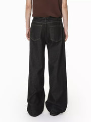 Men's relaxed fit dark wash denim jeans with button fly and wide leg