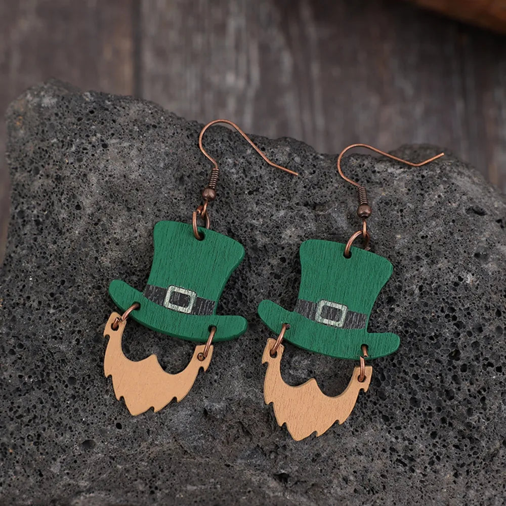 Green leprechaun hat and beard earrings with buckle detail.