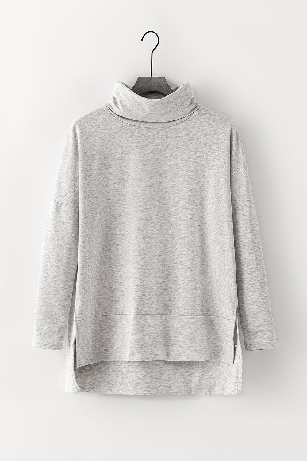 Light gray tunic with cowl neckline and high-low hem.