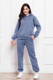 Light blue relaxed hoodie and joggers set with front pocket and drawstring waist.