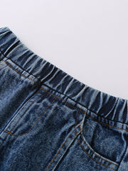 Toddler blue denim jeans with elastic waistband and pocket detail.