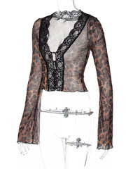 Sheer leopard print t-shirt with black lace trim and long sleeves.