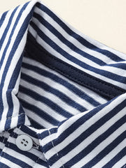 Toddler polo shirt with navy and white stripes, featuring a button closure and comfortable cotton fabric.