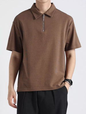 Brown cotton zippered polo shirt with short sleeves and a ribbed texture.