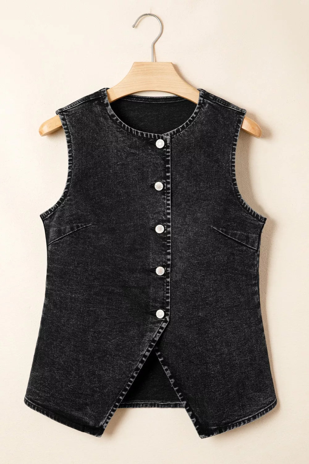 Black denim vest with button front and split hem detail