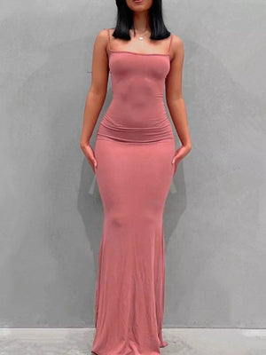Spaghetti strap bodycon maxi dress in burnt coral with ruched detail.